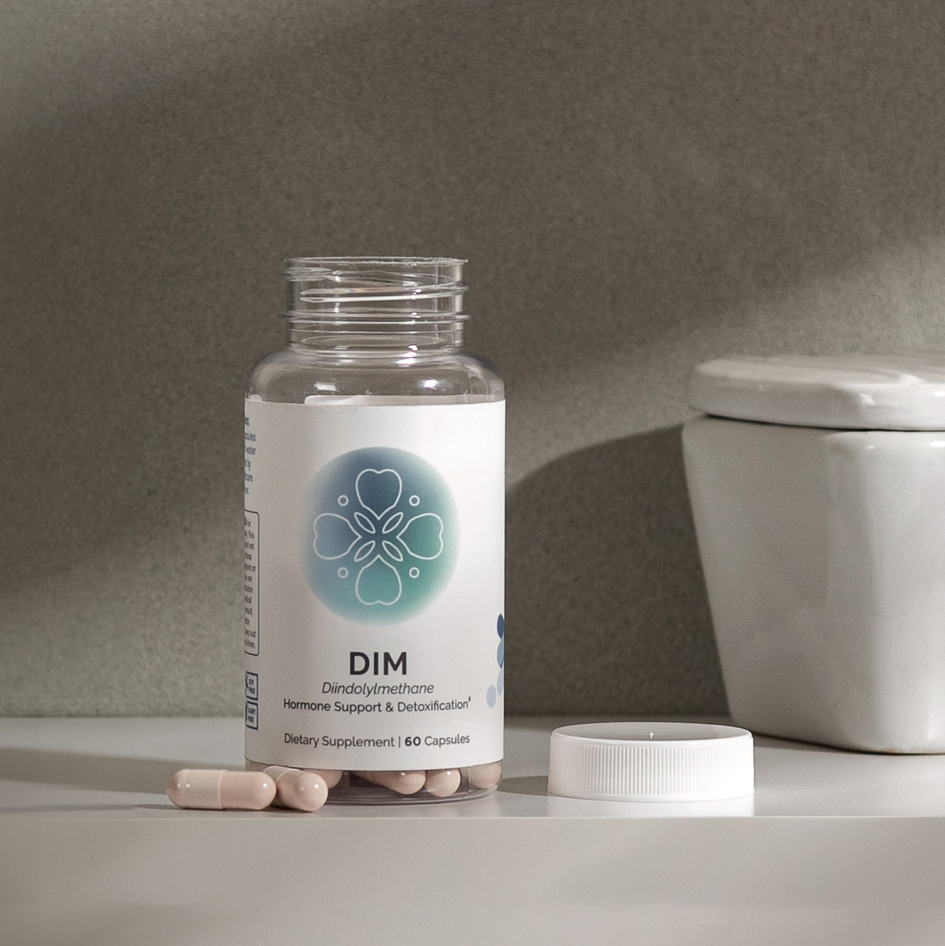 DIM supplement bottle with 60 capsules; hormone support & detoxification.