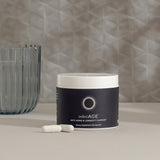 Anti-aging supplement jar with two capsules, 60 servings.