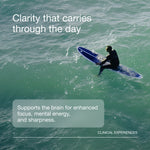 Person sitting on a blue surfboard in the ocean with informational graphic about mental focus and clinical experiences