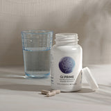 Supplement bottle, capsules, and glass of water;  90-capsule dietary supplement.
