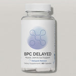 Front label of InfiniWell BPC Delayed delayed-release dietary supplement bottle with 60 capsules on white background.