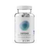 Clear bottle of bone, heart, and immune support capsules.
