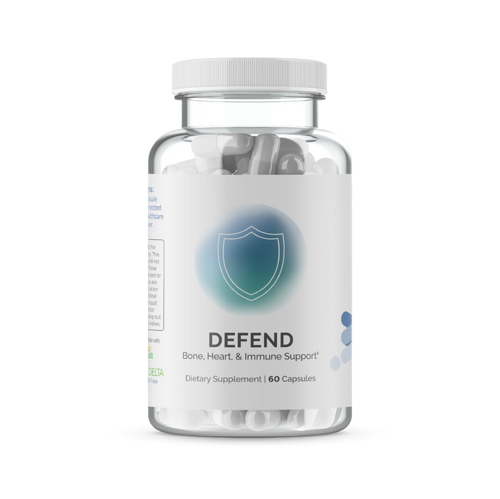 Clear bottle of bone, heart, and immune support capsules.

